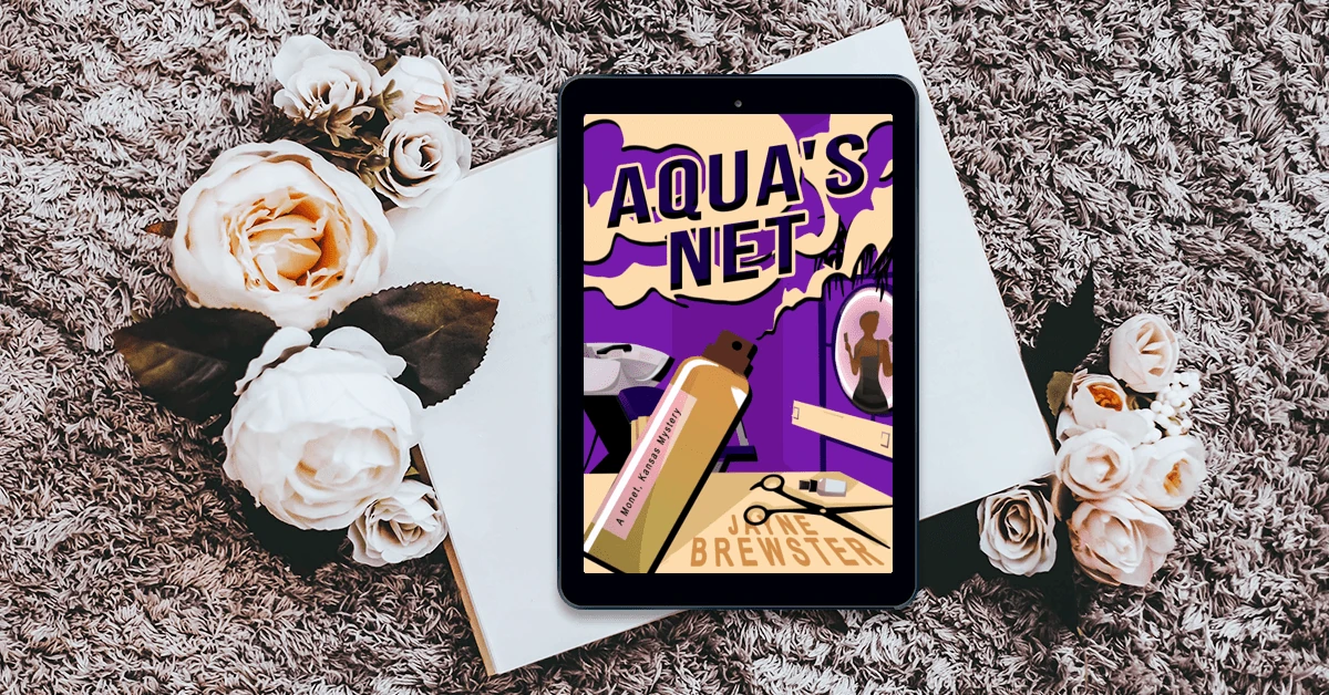 Aqua’s Net displayed on a tablet beside white roses and an open book.
